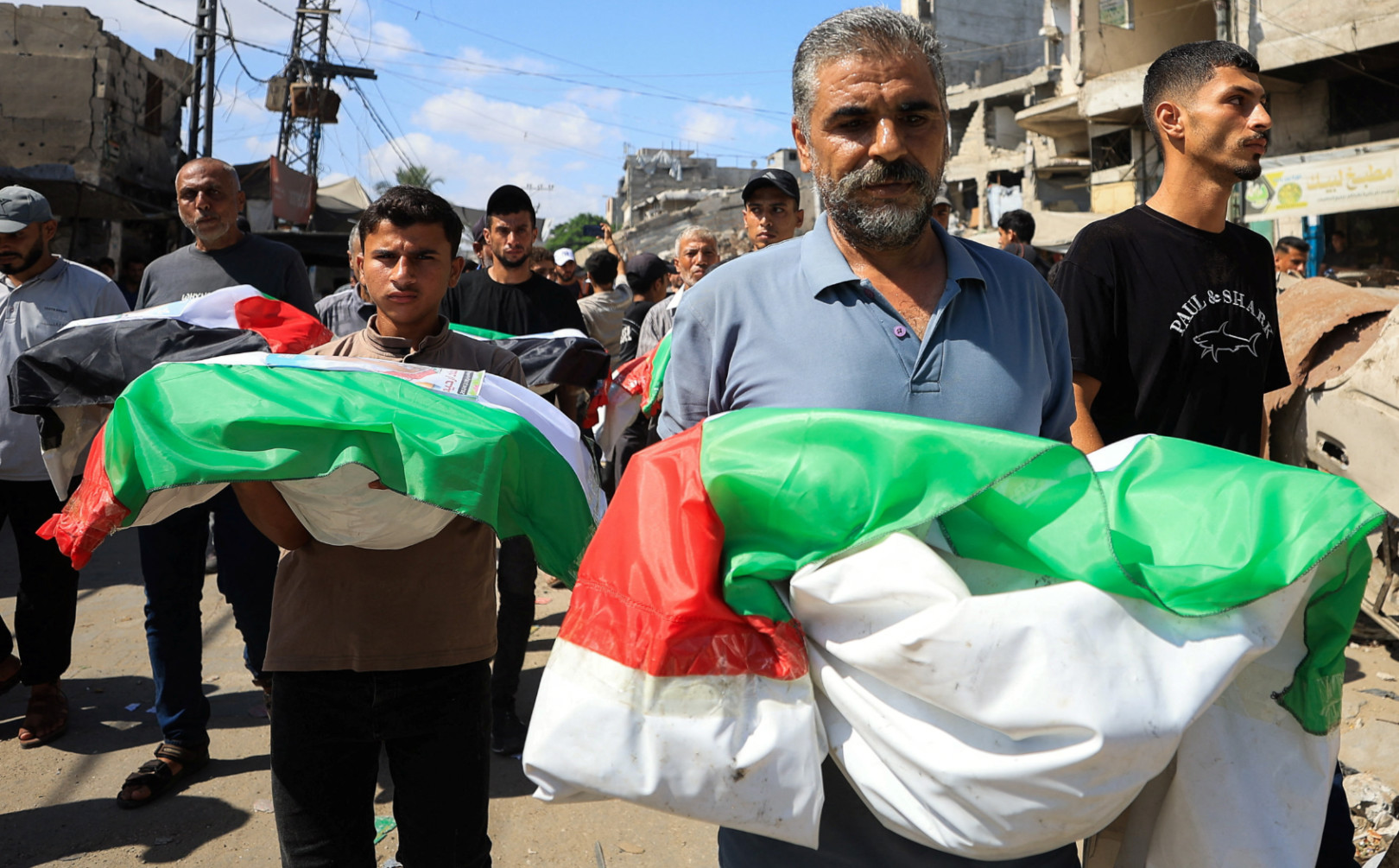 Gaza buries the remains of 100 Palestinians, including 62 children